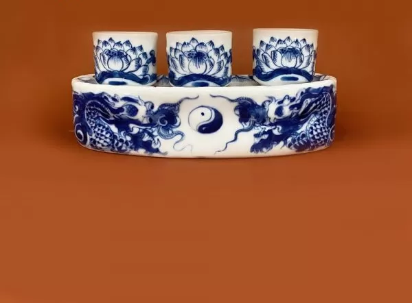 Kỷ Cong Rồng Nổi Men Lam