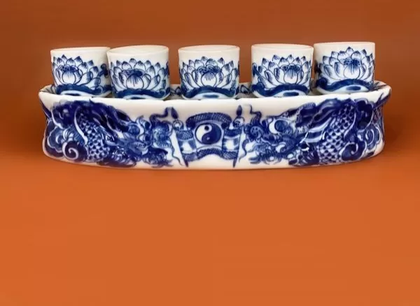 Kỷ Cong Rồng Nổi Men Lam